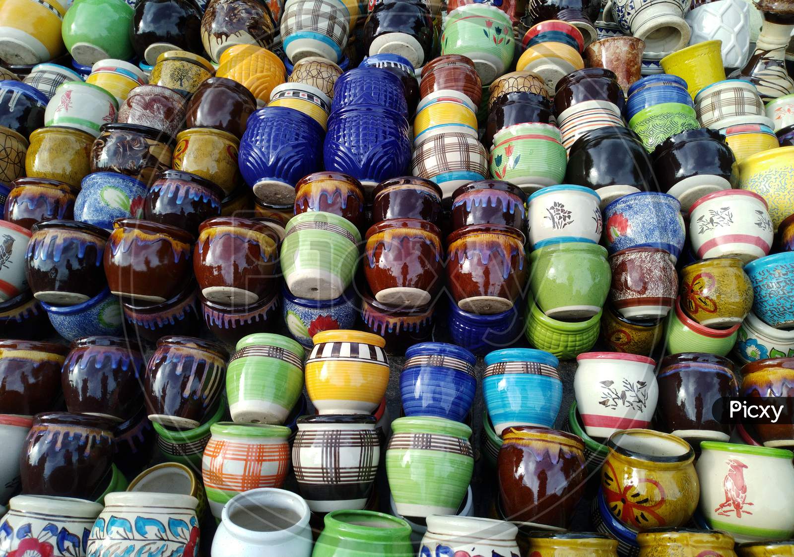 Image of Closeup Photo Of Various Painted Ceramic Pots,Colorful And