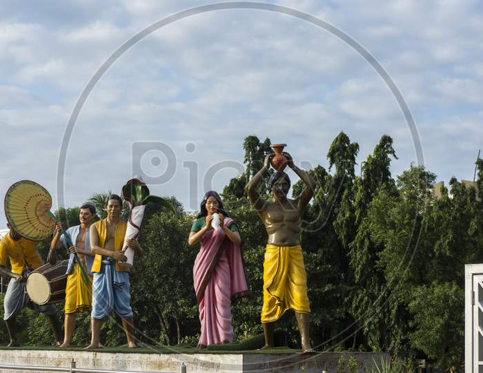 Statues Of Few Porters Carrying Goddess Durga On Their Solder To Decorate City Kolkata In The Process Of Beautification.