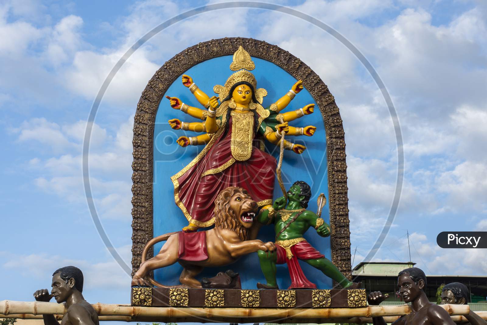 Statues Of Few Porters Carrying Goddess Durga On Their Solder To Decorate City Kolkata In The Process Of Beautification.