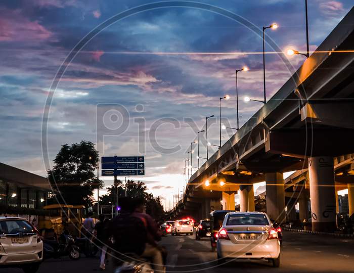 Surat city,cotton candy clouds,lights,street
