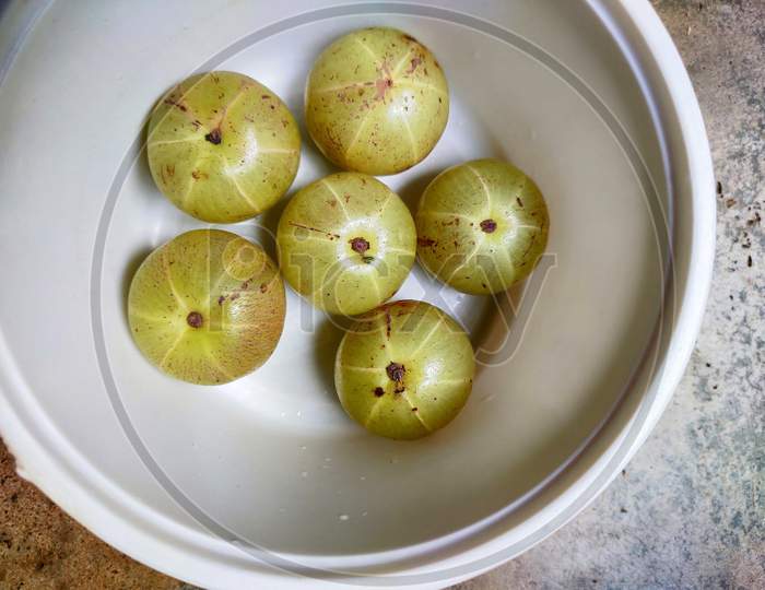 Some gooseberry on a bowl.