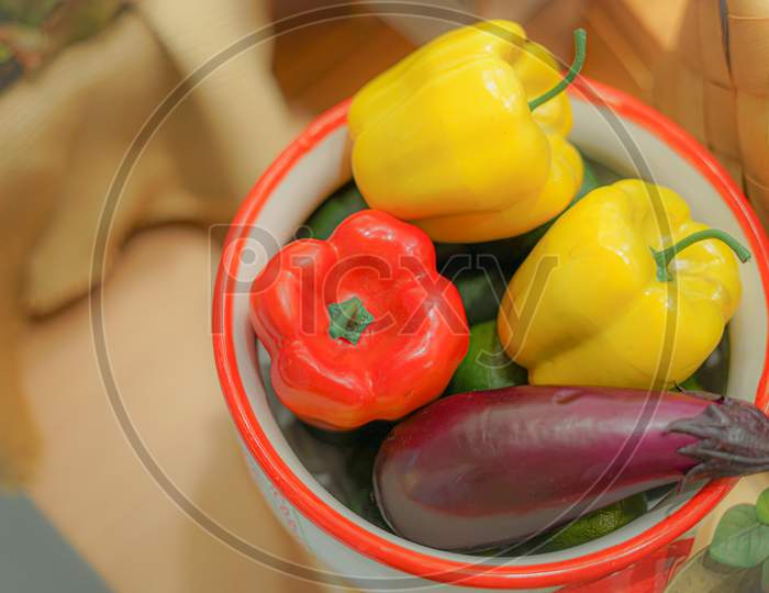 Colorful Vegetables And Fruits That Are Placed In The Basket