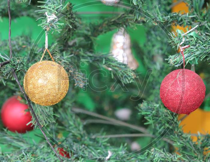 Christmas Balls and  red , yellow  with green