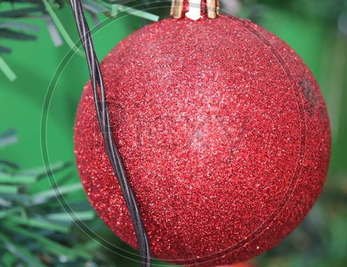 Christmas Tree With  Red Color Glitter  And Decorations