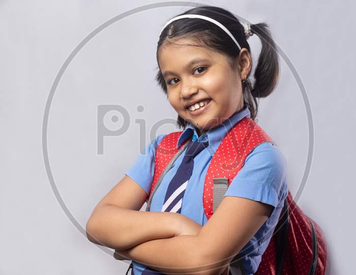 Smiling Girl Child In School Uniform