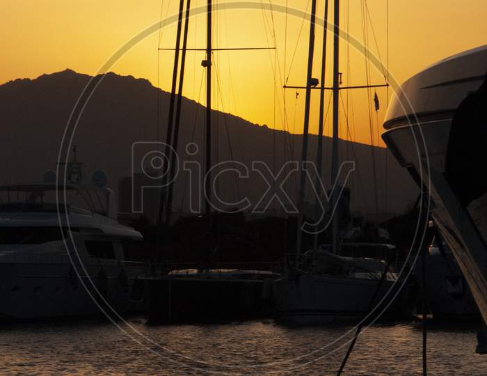 Panoramic View Of Marina Di Olbia Port And Yacht Marina At Sunset