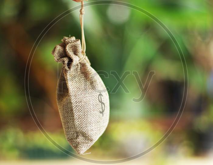 A View Of A Money Bag Stock Photo Hanging
