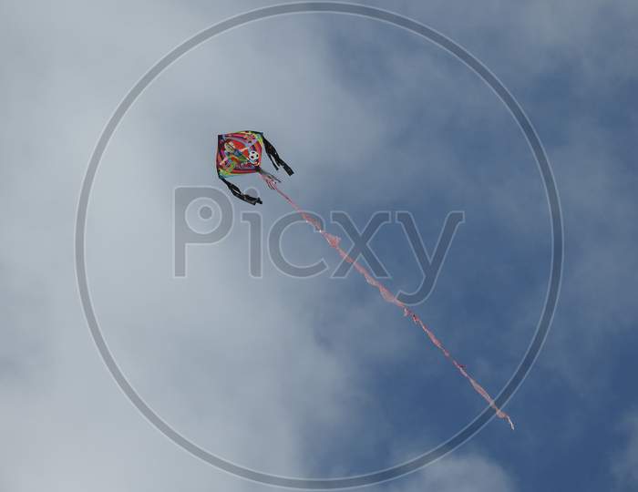 Colorful Kites Flying On The Wind In Bangalore City With Heaven Cloud Sky Background