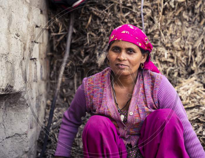 Moradabad, Uttar Pradesh- January 12 2022- Portrait Of A Village Woman Working In Jaggery Factory In Gad Mukteshwar.