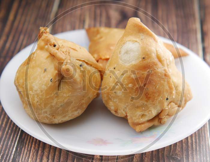 Detail Shot Of A Indian Food Samosa On Plate