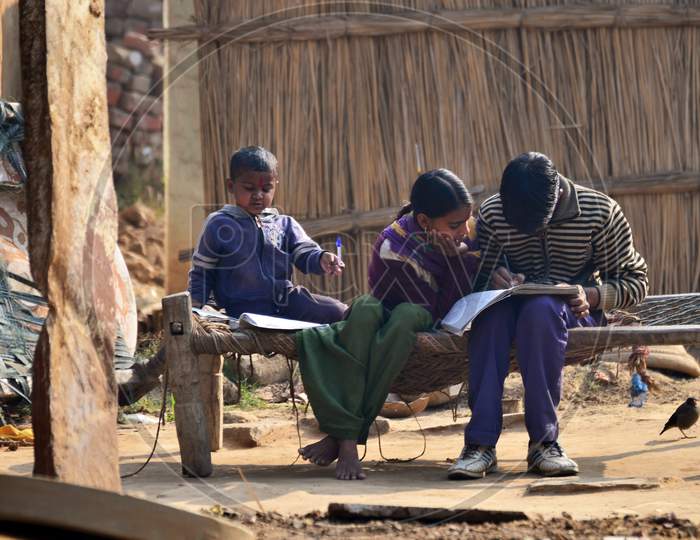 Jaipur, India - December 30, 2014: Unknown Children Doing Homework At Home In Jaipur