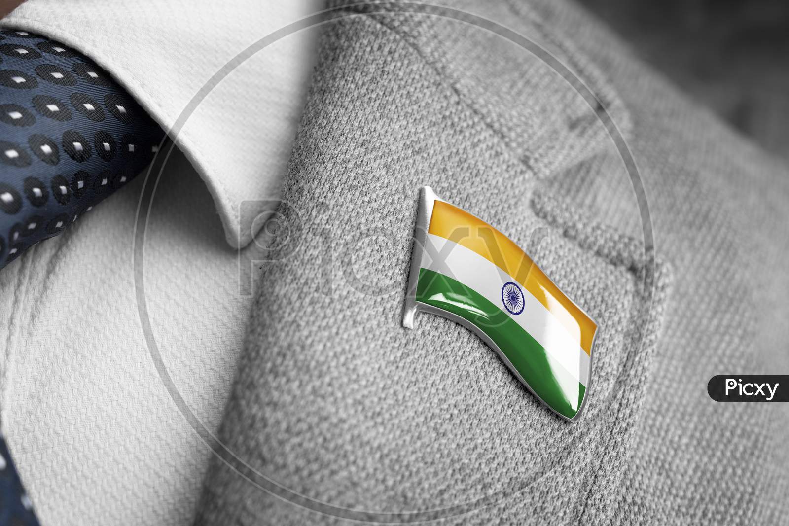 Metal Badge With The Flag Of India On A Suit Lapel