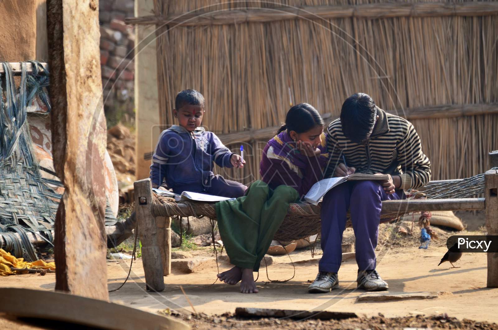 Jaipur, India - December 30, 2014: Unknown Children Doing Homework At Home In Jaipur