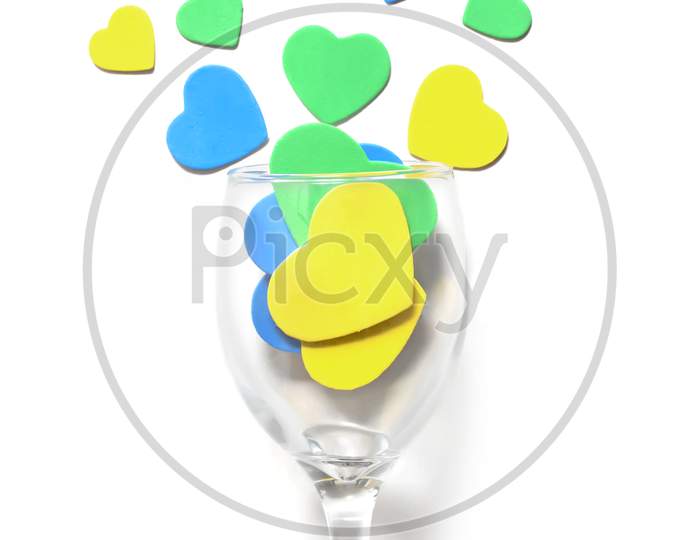 Valentine'S Day Background. Multi-Colored Hearts In A Glass, Isolated In White