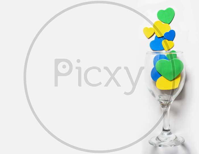 Valentine'S Day Background. Multi-Colored Hearts In A Glass, Isolated In White