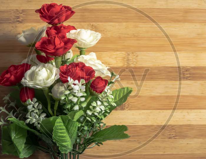 Valentine'S Day Backgrounds. Bouquet Of Roses On A Wooden Table For The Concept Of Love.