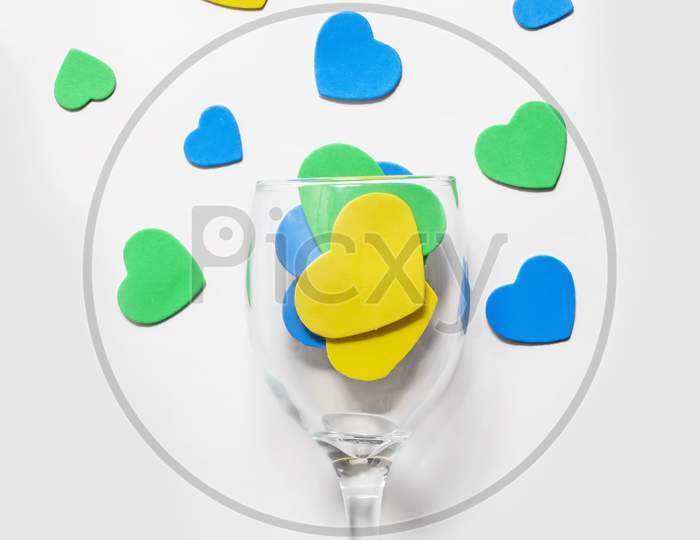 Valentine'S Day Backgrounds. Multi-Colored Hearts In A Glass, Isolated In White