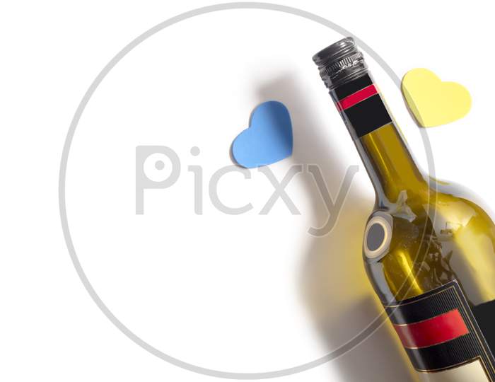 Valentine'S Day Background. Small Hearts And A Bottle Of Wine On An Isolated White Background. Top View, Copy Space
