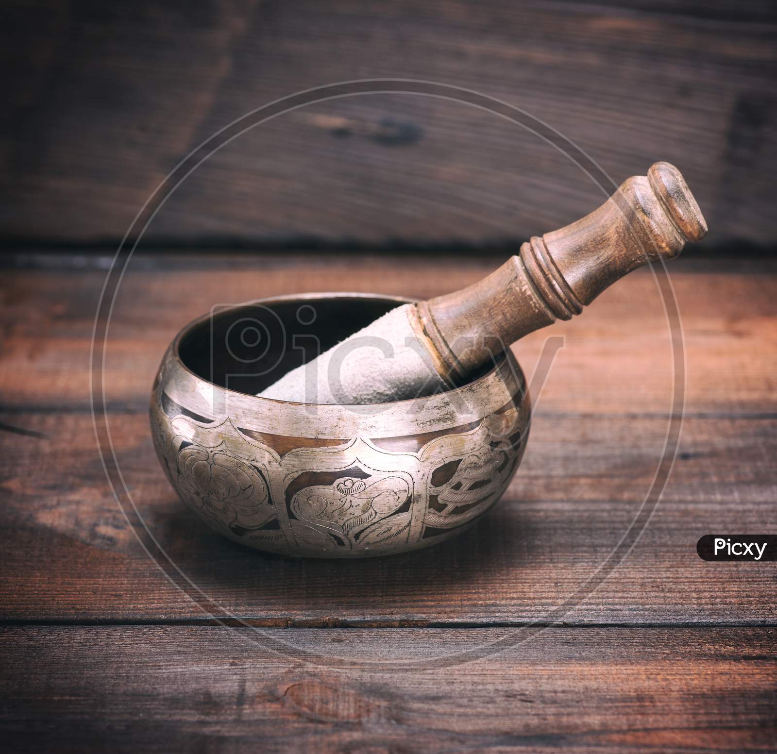 Copper Singing Bowl And A Wooden Stick