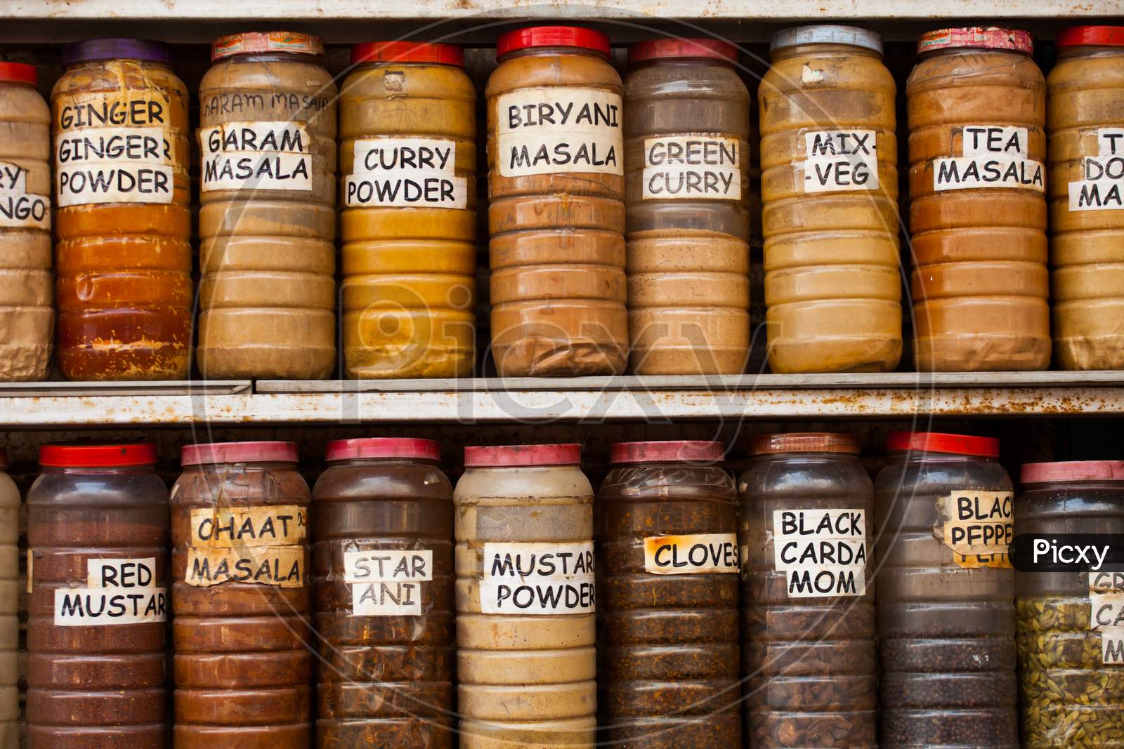 Jars Of Herbs And Powders In A Indian Spice Shop.