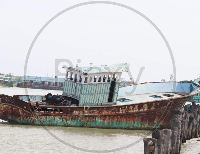 "Tamil Nadu/India-15.03.2021:Damaged Boat In The Near  Pondicherry Beach ,Tamil Nadu,India"
