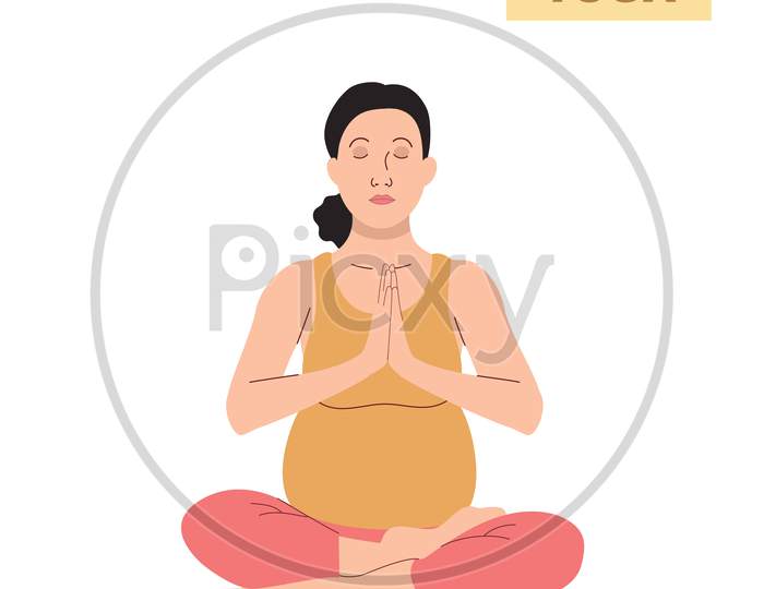 Pregnant woman doing yoga | A Pregnant Woman Doing Yoga