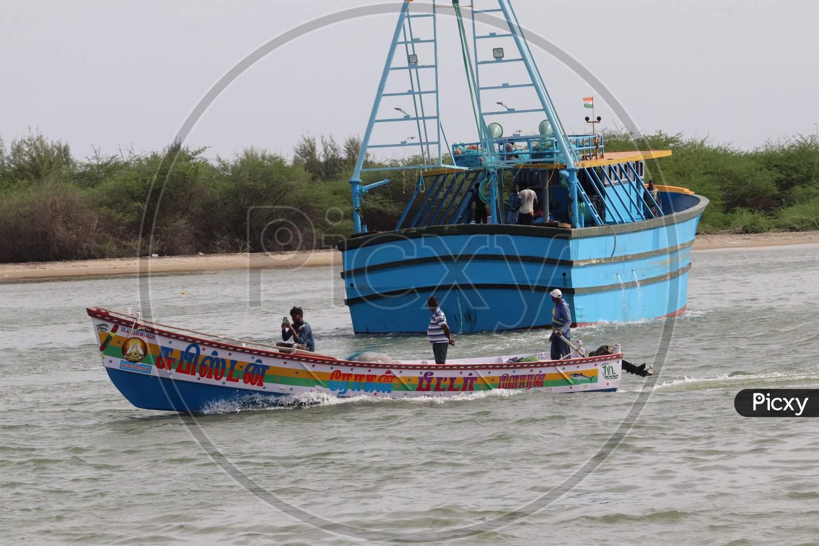 "Coimbatore,Tamil Nadu/India-15.06.2021:Two  Fishing  Boats In Pondicherry Beach In Sea "
