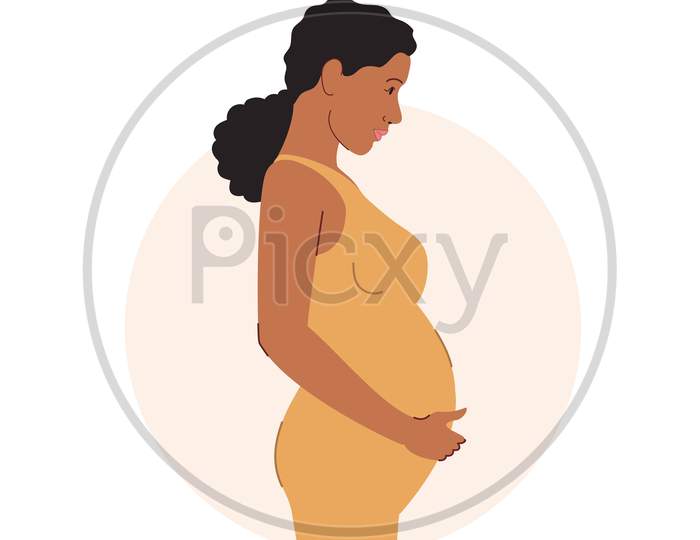 Young beautiful pregnant black woman | A pregnant black woman | A pregnant woman
