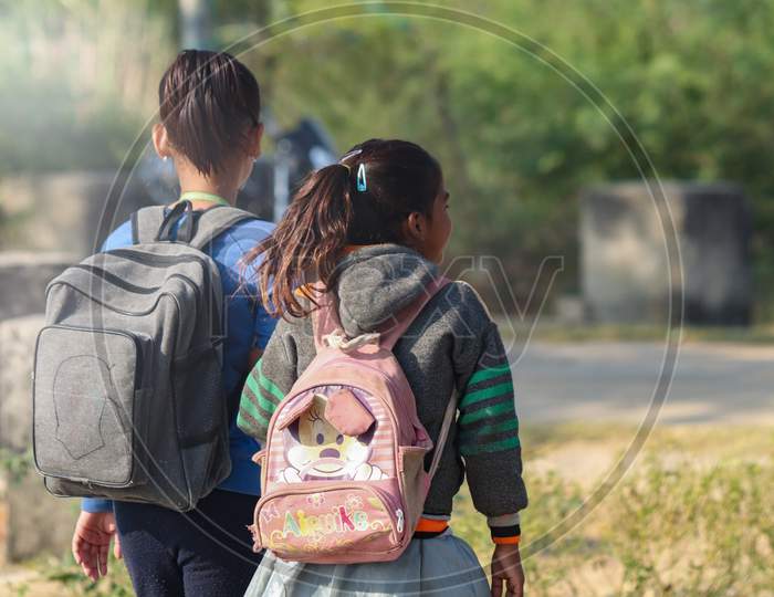 Two Child Girl Going School.