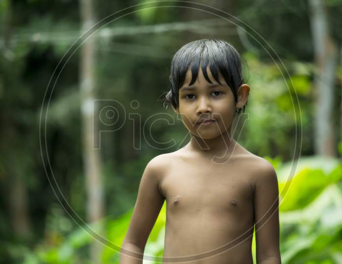 03-Oct-2021, Barisal, Bangladesh. Little Baby On A Green Background
