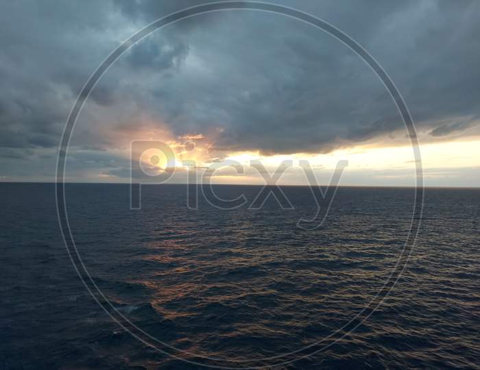 Golden Sunset And Cloudy Sky ,View From A Cruise Ship