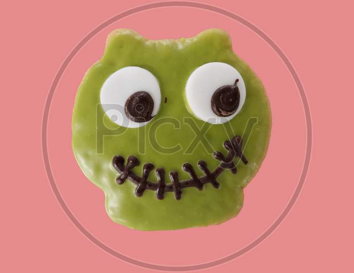 Owl Face On Sable Cookies Isolated In Pink Background ,Halloween Day Special