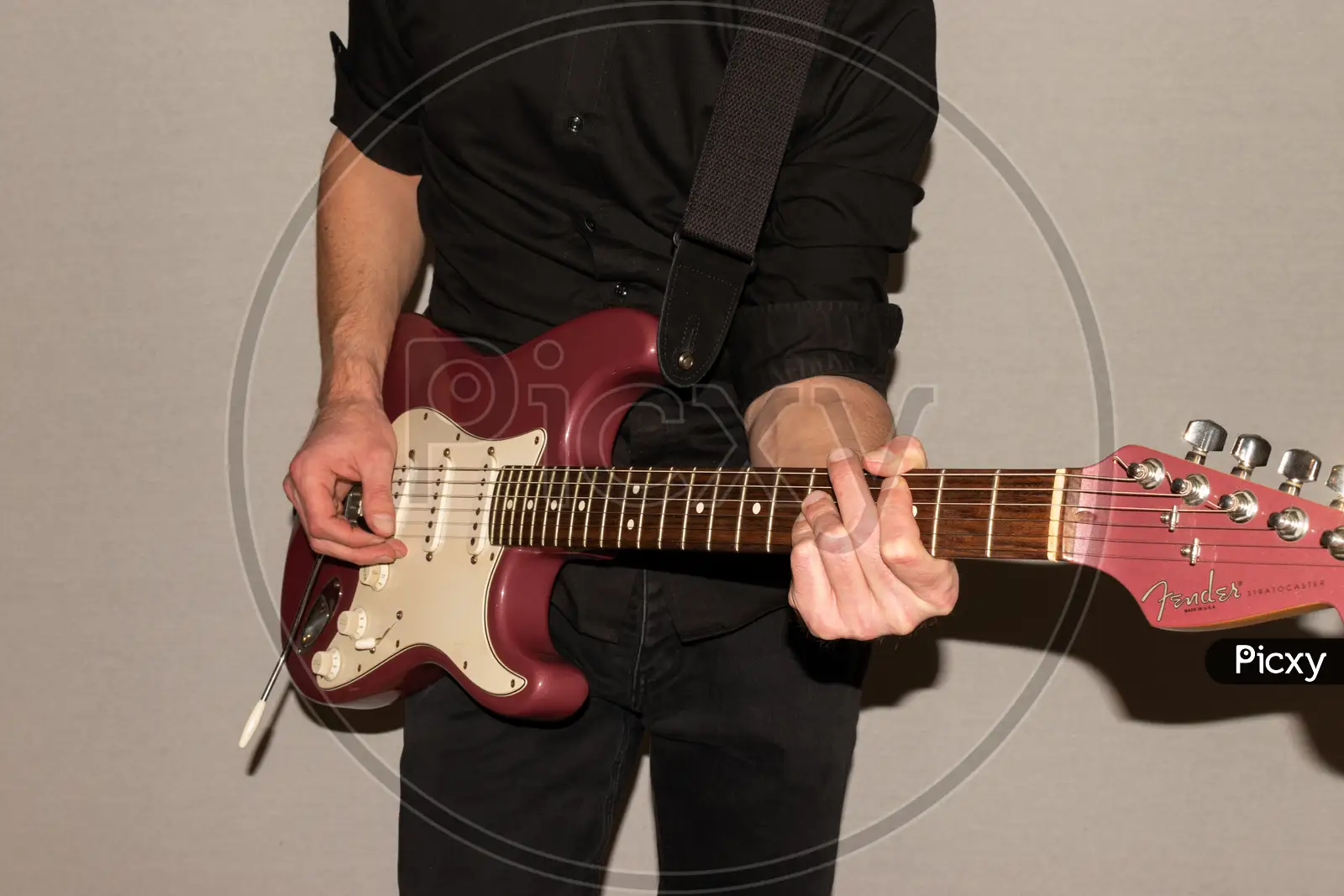 Image of Artist With A Fender Stratocaster Usa Electric Guitar In