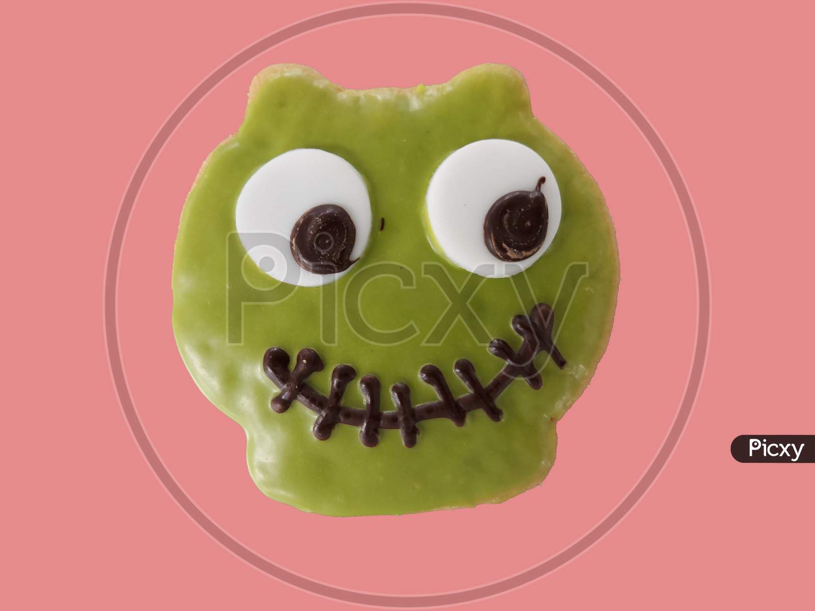 Owl Face On Sable Cookies Isolated In Pink Background ,Halloween Day Special
