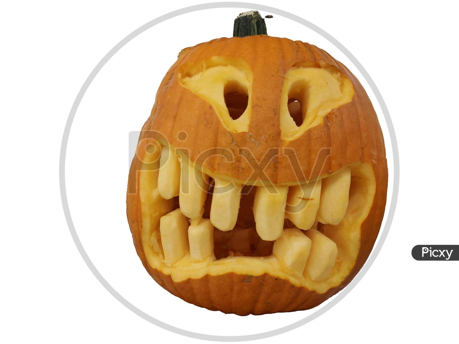 Scary Ghost Face Carving On A Pumpkin For Halloween