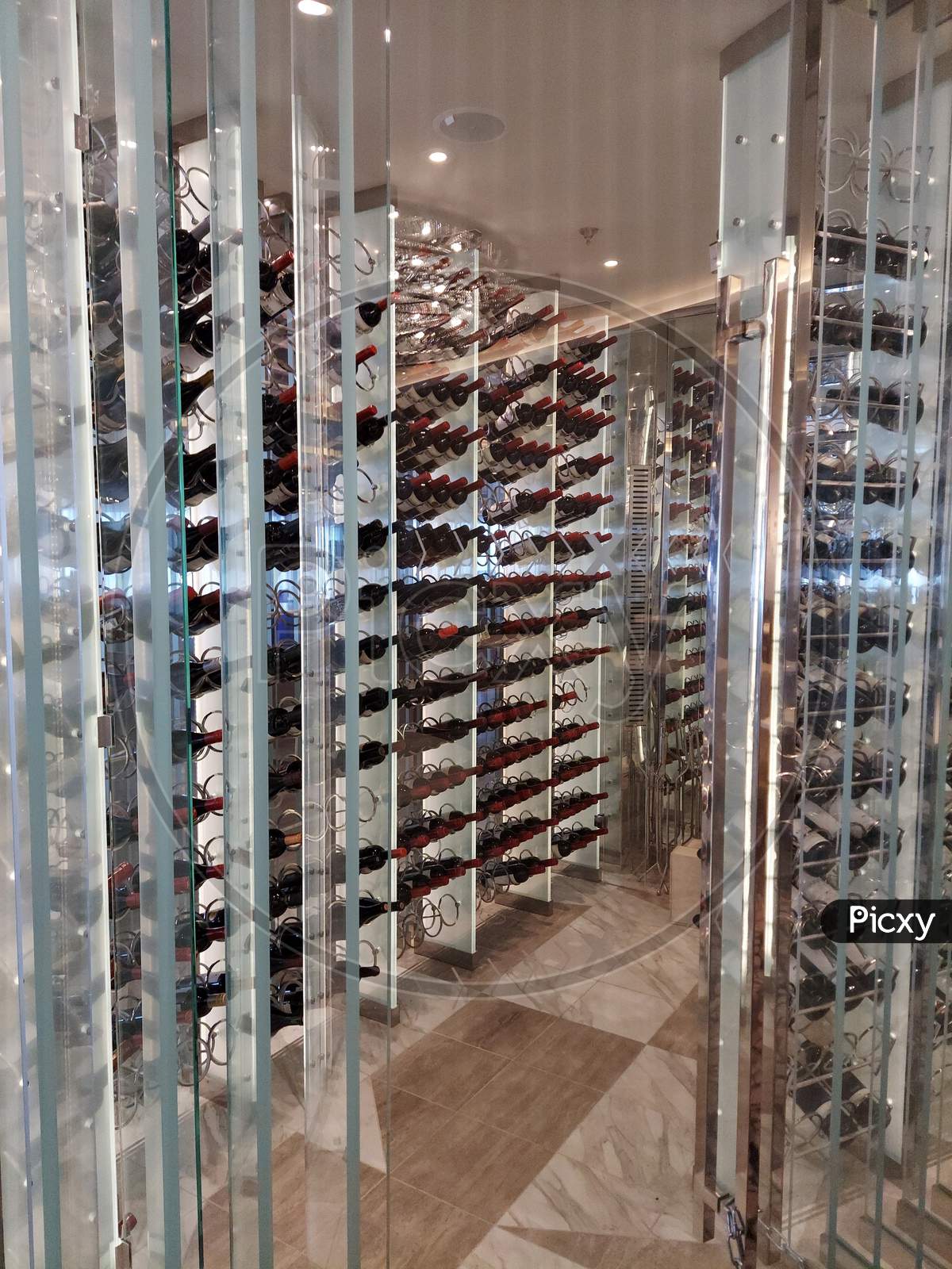 Beautifully Arranged Wine Bottles Display On A Cruise Ship Restaurant Entrance