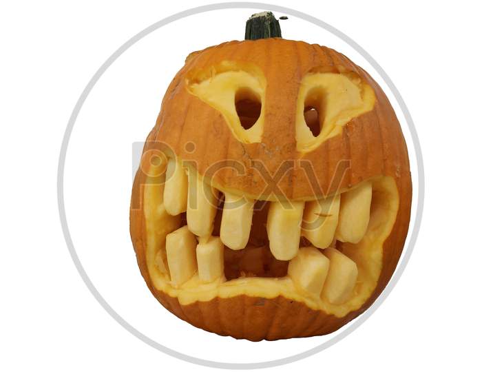 Scary Ghost Face Carving On A Pumpkin For Halloween