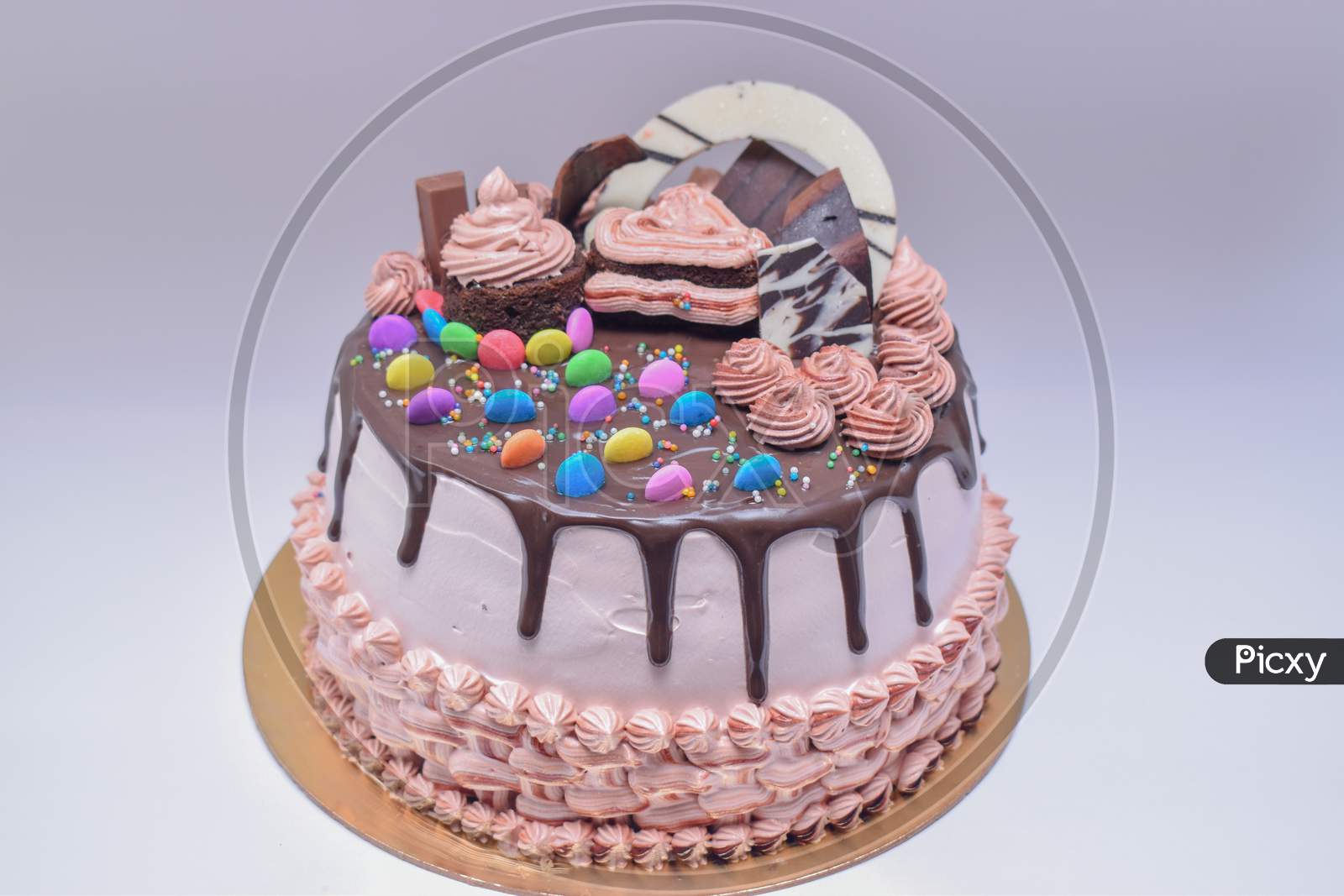 Relishdelishcakes - A simple Falling Gems Chocolate Cake for a 2 yrs old  Gems Lover boy🍡🍡 | Facebook