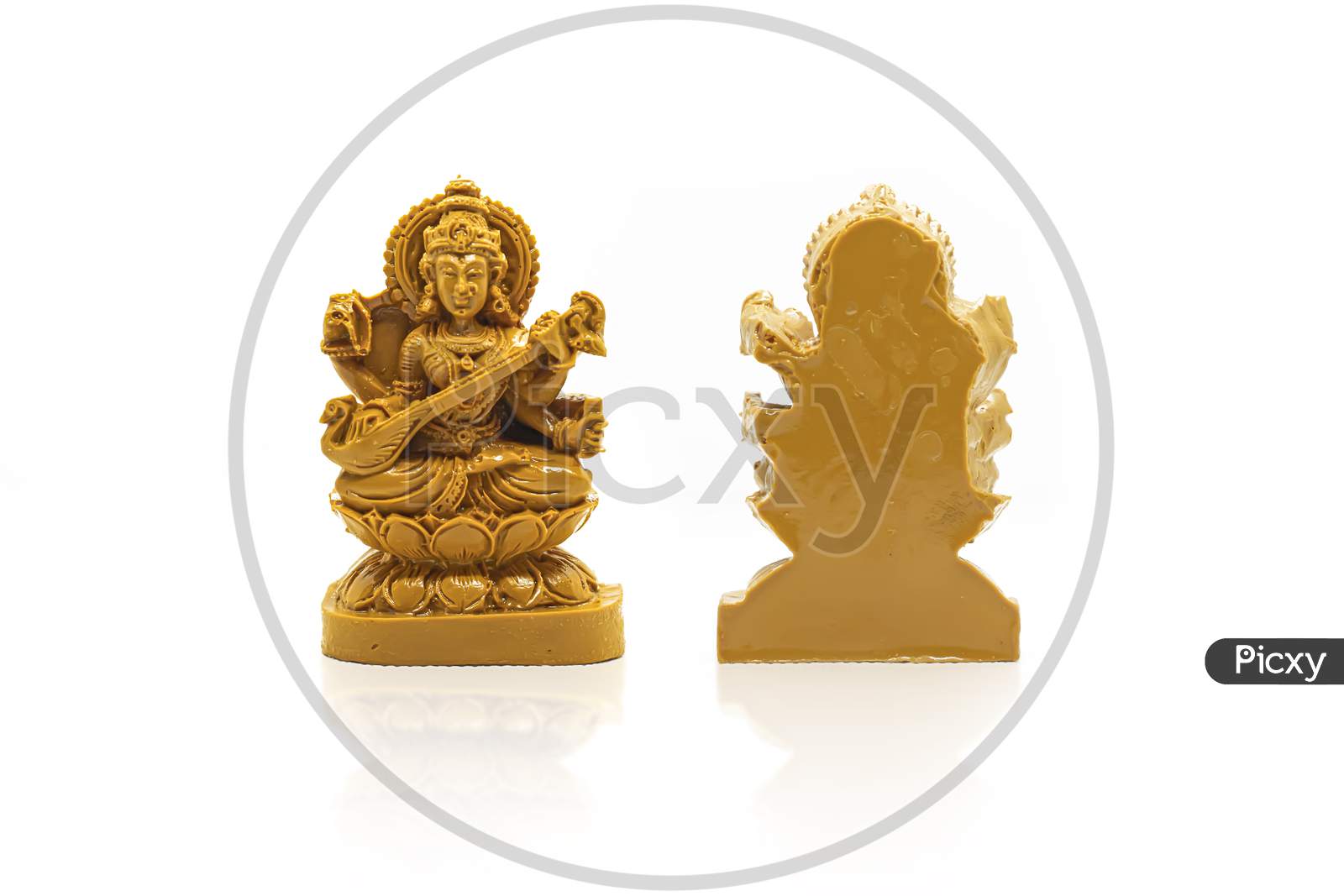 Brown Wood Carved Saraswati Statue In Front And Back Isolated In White With Reflection