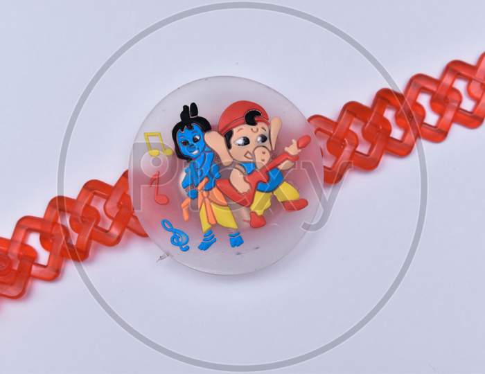 Wrist Band With Lord Krishna And Lord Ganesha On It On White Background