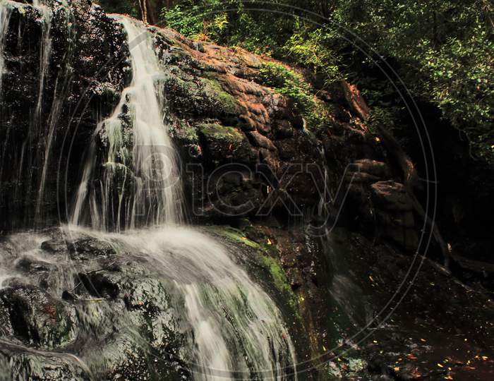 vattakanal waterfall on levinge stream on palani mountain foothills at kodaikanal in tamilnadu, south india