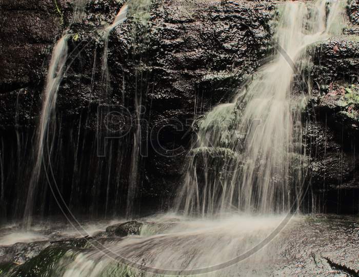 vattakanal waterfall on levinge stream on palani mountain foothills at kodaikanal in tamilnadu, south india