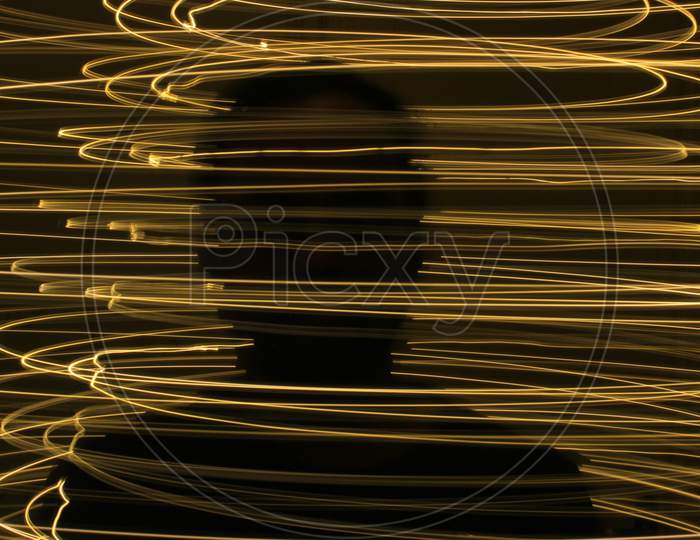 Abstract Colorful Irregular Lines On Black Background Photo With Long Exposure.Light Painting Photography.Lights With Irregular Patterns For Overlay