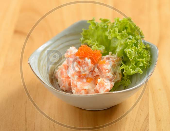Japanese Food Shishamo Mentai Sauce In A Bowl Isolated On Wooden Background Top View