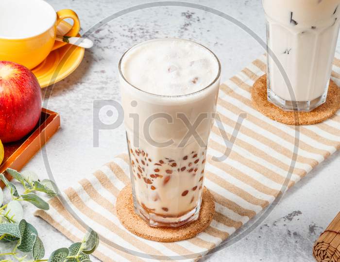 Pearl Milk Tea Boba / Bubble Tea In Glass Jar On Mat With Grey Background Breakfast Drink