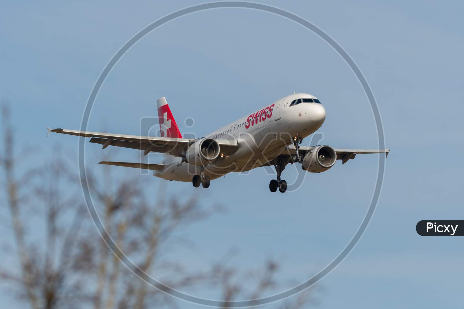 Swiss Airbus A320-214 Airplane Arrival In Zurich In Switzerland