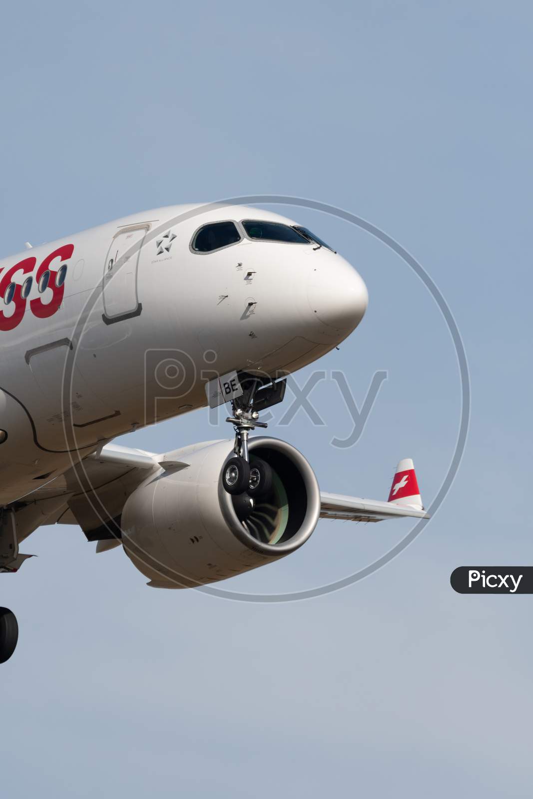 Swiss Bombardier Cs 100 Jet Final Approach In Zurich In Switzerland