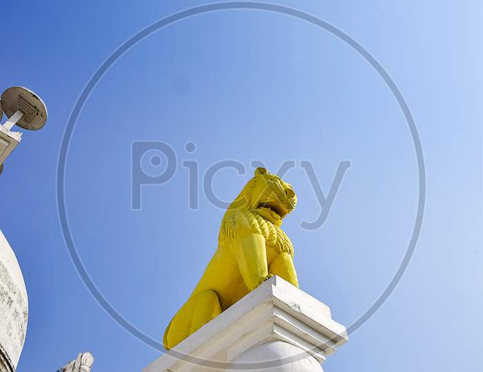 Lion Statue At The Gate Of Dauli Or Dauligiri Or Dhabalgiri Shanti Stupa Temple A World Heritage And Peace Site.