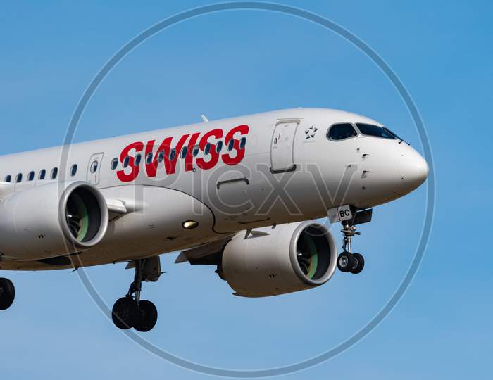 Swiss Bombardier Cs 100 Airplane Arrival In Zurich In Switzerland